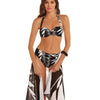 Model holding 'Sina' Black and White Pareo/Wrap, by Roidal.