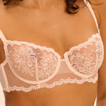 Model wearing S'Intrigue' Pink Half Cup Bra, by imone Pérèle (front view, close up).