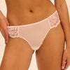 Model wearing 'Intrigue' Pale Pink Tanga, by Simone Pérèle (front view, close up).