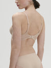 Model wearing 'Karma' Beige Pink 3D Moulded Bra, by Simone Pérèle (back view).