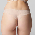 Model wearing 'Karma' Pale Pink Tanga, by Simone Pérèle (back view, close up).