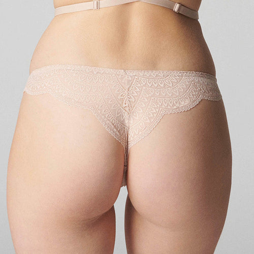 Model wearing 'Karma' Pale Pink Tanga, by Simone Pérèle (back view, close up).
