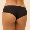 Model wearing 'Romance' Dark Brown Shorty, by Simone Pérèle (back view, close up).