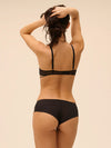 Model wearing 'Romance' Dark Brown Shorty, by Simone Pérèle (back view).