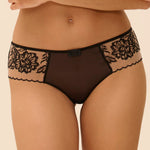 Model wearing 'Romance' Dark Brown Shorty, by Simone Pérèle (front view, close up).