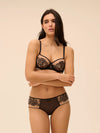 Model wearing 'Romance' Dark Brown Shorty, by Simone Pérèle (front view).
