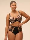 Plus-size model wearing 'Romance' Dark Brown Deep Brief, by Simone Pérèle (front view).