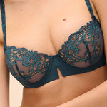 Model wearing 'Saga' Teal Half Cup Bra, by Simone Pérèle (front view, close up).