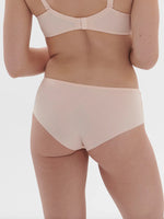 Model wearing 'Saga' Pale Pink Shorty, by Simone Pérèle (back view).