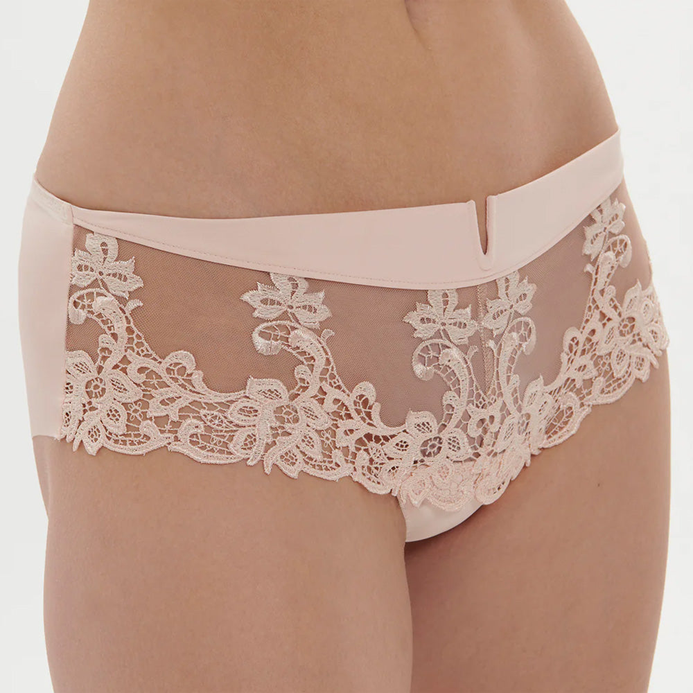 Model wearing 'Saga' Pale Pink Shorty, by Simone Pérèle (front view, close up).