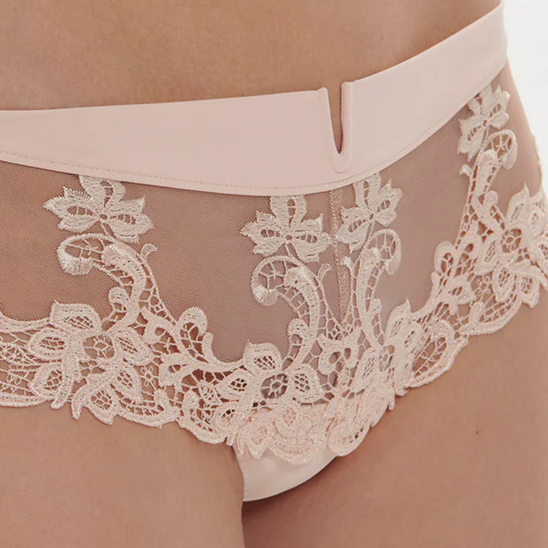 Model wearing 'Saga' Pale Pink Shorty, by Simone Pérèle (front view, close up detail).