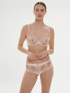 Model wearing 'Saga' Pale Pink Shorty, by Simone Pérèle (front view).