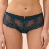 Model wearing 'Saga' Teal Shorty, by Simone Pérèle (front view, close up).