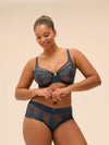 Model wearing 'Saga' Teal Shorty, by Simone Pérèle (front view).