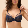 Model wearing 'Wish' Midnight Blue Underwired Full Cup Plunge Bra, by Simone Pérèle (front view).