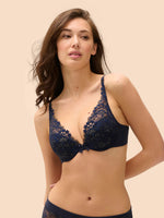 Model wearing 'Wish' Midnight Blue Plunging Push-Up Bra, by Simone Pérèle (front view).