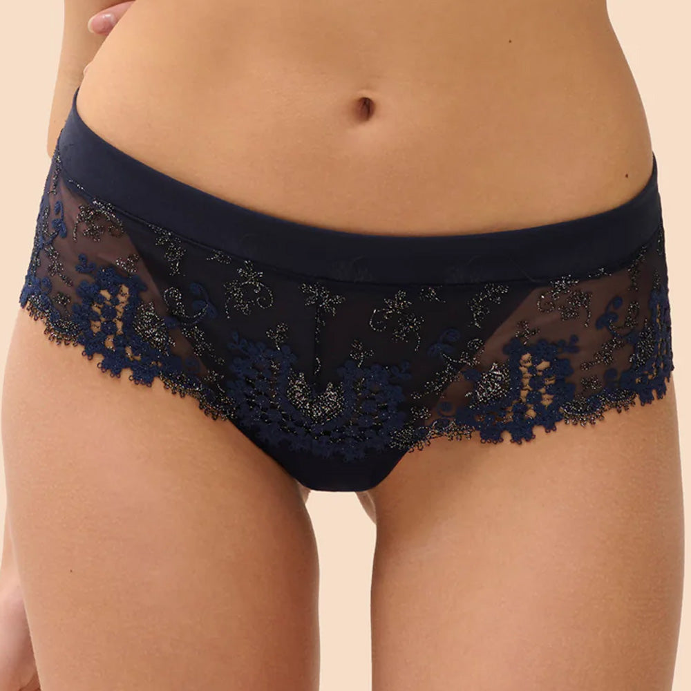 Model wearing 'Wish' Midnight Blue Shorty, by Simone Pérèle (front view, close up).