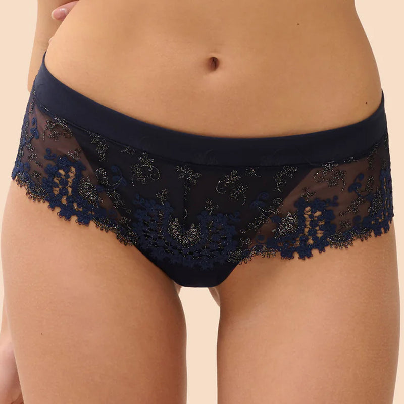 Model wearing 'Wish' Midnight Blue Shorty, by Simone Pérèle (front view, close up).
