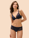 Model wearing 'Wish' Midnight Blue Shorty, by Simone Pérèle (front view).