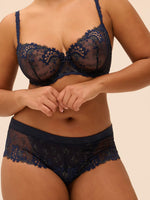 Plus size model wearing 'Wish' Midnight Blue Shorty, by Simone Pérèle (front view).