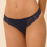 Model wearing 'Wish' Midnight Blue Tanga, by Simone Pérèle (front view, close up).
