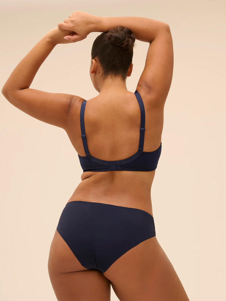 Plus size model wearing 'Wish' Midnight Blue Brief, by Simone Pérèle  (back view).