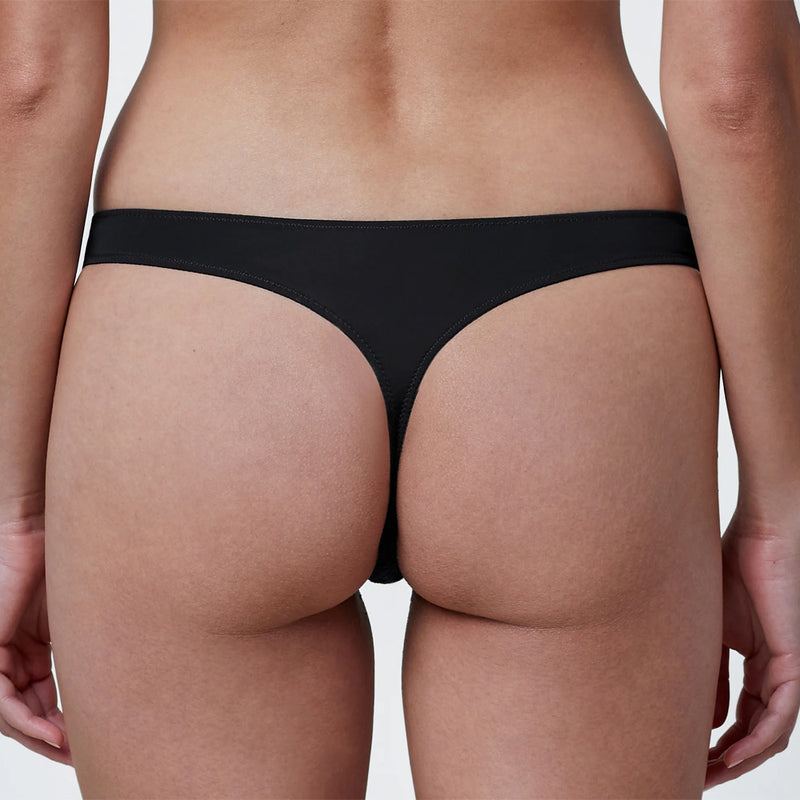 Model wearing 'Entice' Midnight Blue and Black Thong, by Skarlett Blue (back view, close up).