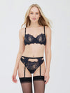 Model wearing 'Entice' Midnight Blue and Black Suspender Belt, by Skarlett Blue (front view).