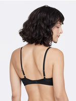 Model wearing 'Minx' Black Padded Balconette Bra, by Skarlett Blue (back view).