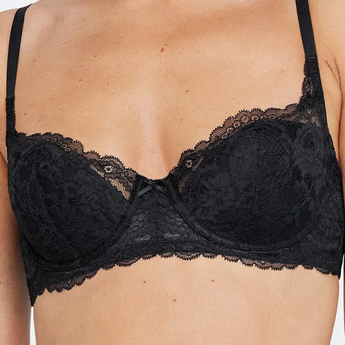 Model wearing 'Minx' Black Padded Balconette Bra, by Skarlett Blue (front view, close up).